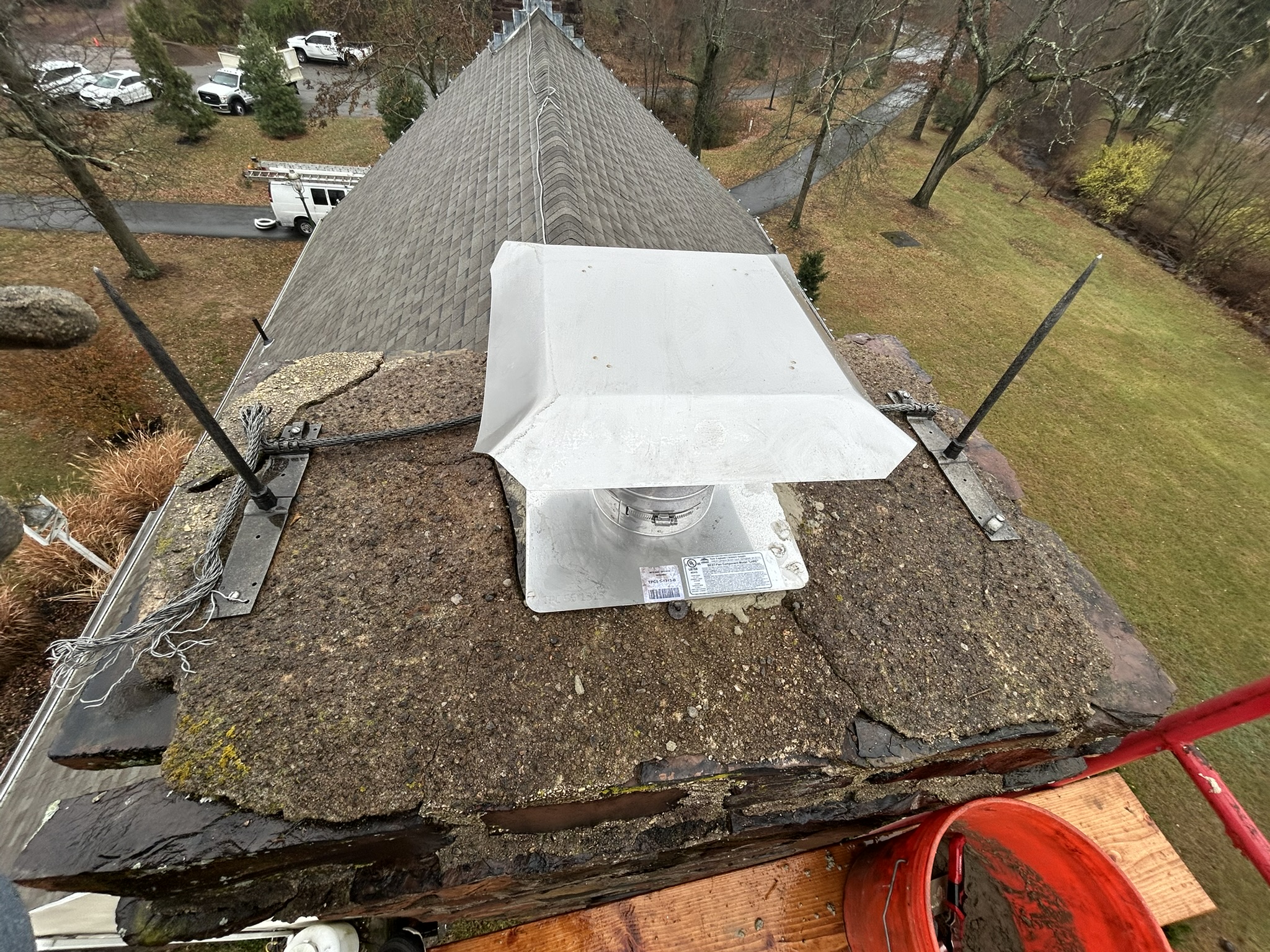 Stainless steel top plate and cap installed